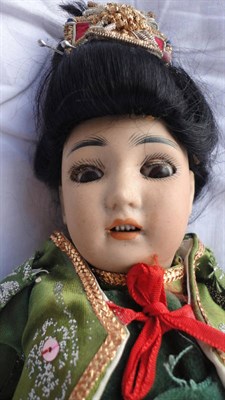 Lot 1032 - Simon and Halbig Bisque Socket Head Oriental Doll, impressed 1329 with sleeping brown eyes,...