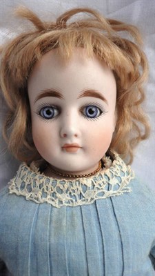 Lot 1034 - Possibly Jumeau Bisque Shoulder Head Doll (unmarked) with fixed blue glass eyes, closed mouth,...