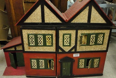 Lot 1042 - 20th Century Dolls House with two hinged front doors, enclosing four rooms and a central staircase