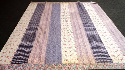 Lot 1060 - Large 19th Century Striped Quilt, 240 cm by 260 cm and a White Quilt, 130 cm by 200 cm (2)