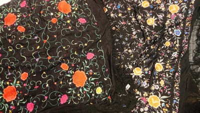 Lot 1063 - Black Silk Canton Shawl embroidered with coloured flowers and tassel fringing and another...