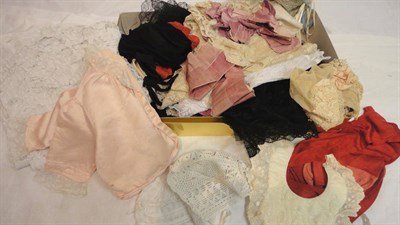 Lot 1103 - Various Early 20th Century Costume Accessories including bonnets, stockings, lace stole and...