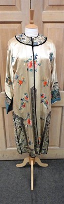 Lot 1110 - Chinese Cream Silk Coat, embroidered with flowers