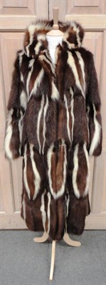 Lot 1150 - Brown and White Skunk Three Quarter Length Coat with suede trims to the sides