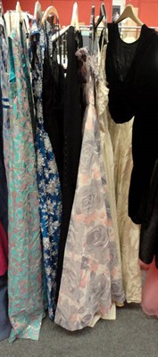 Lot 1155 - Eight Assorted Circa 1950's and Later Evening Dresses, including a Maryon floral printed...