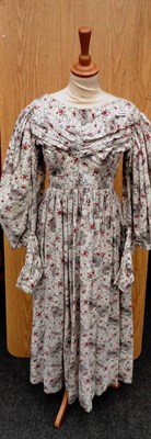 Lot 1188 - Mid 19th Century Cotton Printed Dress with gathered detailing to the bodice and leg of mutton...