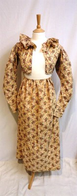 Lot 1189 - Circa 1830's Printed Cotton Day Dress, of floral printed design with a gathered collar and long...