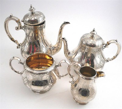 Lot 4 - A Victorian and later silver four piece tea service, Sheffield 1865 and Birmingham 1905
