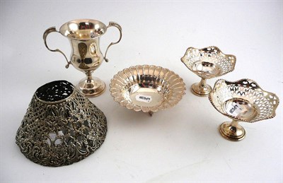 Lot 9 - Pair of silver baskets, silver cup, pair of white metal candle shades and a silver dish