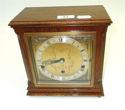 Lot 21 - Garrard and Co oak mantel clock