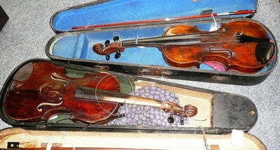 Lot 53 - Two violins with bows, in stained pine coffin cases (a.f.)