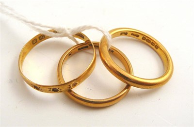 Lot 84 - Three 22ct gold band rings