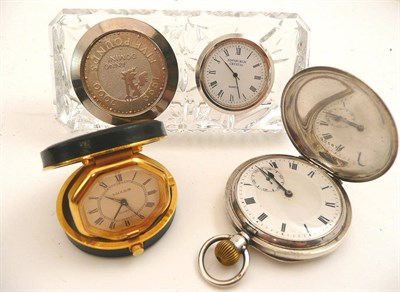 Lot 88 - A silver pocket watch, an Edinburgh crystal clock and a travel clock