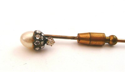 Lot 90 - A diamond and pearl stick pin, cased