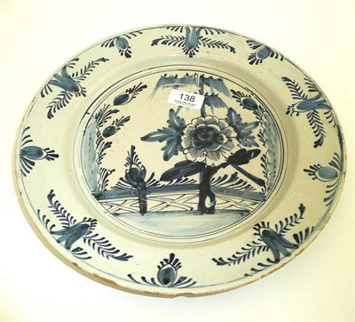 Lot 138 - A Continental Delft plate with blue and white decoration