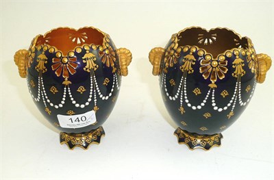 Lot 140 - Pair of Coalport blue glaze and enamel decorated pierced vases (one a.f.)