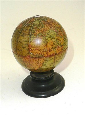 Lot 141 - A Clark & Co Anchor cotton reel holder in the form of a globe