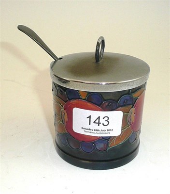 Lot 143 - A Moorcroft Pomegranate pattern jam pot