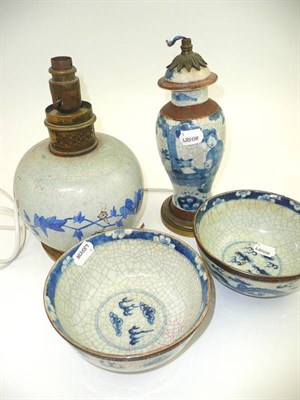 Lot 165 - Two Chinese blue and white crackle glaze bowls and two lamps with metal mounts
