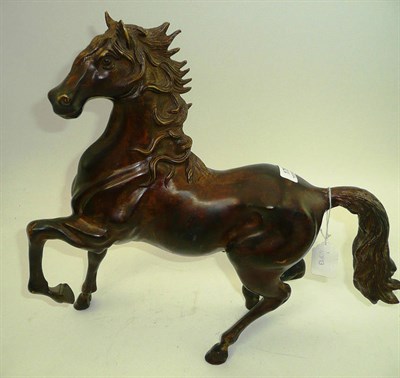 Lot 175 - A bronze horse