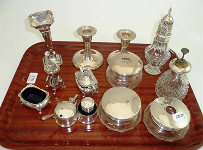 Lot 178 - Four silver topped dressing table items, a glass sugar caster with silver cover, a pair of...
