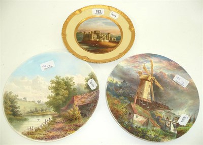 Lot 182 - A 19th century porcelain plate painted with Eastnor Castle, Herefordshire, by C Hayton, 1821...
