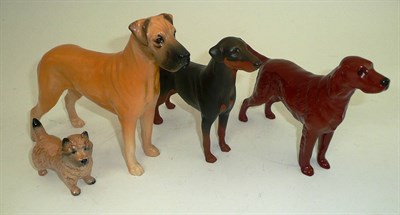 Lot 188 - Four Beswick dogs