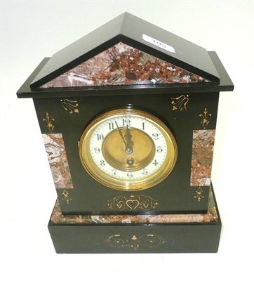 Lot 192 - A black slate mantel timepiece