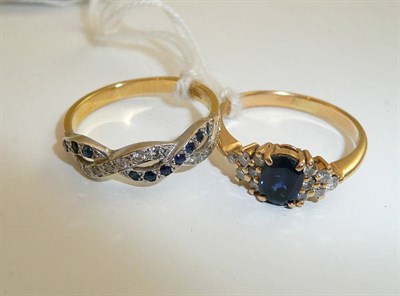 Lot 211 - A sapphire and diamond ring and an 18ct gold sapphire and diamond ring (2)