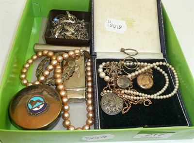 Lot 217 - An Edwardian seed pearl set star pendant and chain, a locket and chain, a cultured pearl...