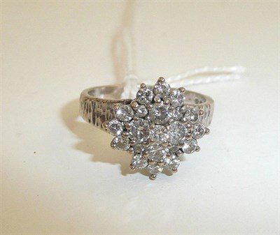 Lot 229 - An 18ct white gold diamond cluster ring