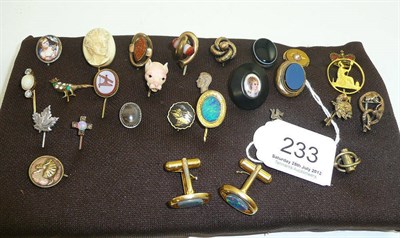 Lot 233 - Twenty-six tie pins including examples set with opal and diamonds, sardonyx, pearl, and paste,...