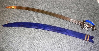 Lot 242 - An 18th century Indian Talwar, with 78cm single edged curved steel blade with two shallow...