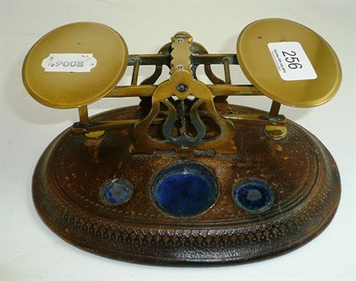 Lot 256 - S Mordan & Co leather mounted brass postal scales and weights