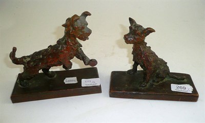 Lot 269 - A pair of bronze figures of comic terriers on rectangular plinths by Edith Baretto Parsons