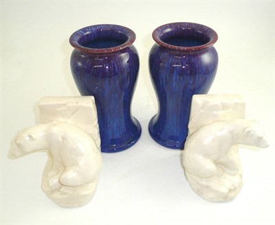 Lot 285 - Pair white glazed polar bear book ends, and pair of Langley mottled purple glazed vases (4)