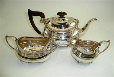 Lot 302 - A three piece silver tea set, Chester 1935