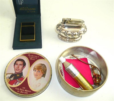 Lot 338 - A Dupont gold plated and lacquer lighter, cased, a Ronson lighter, a tin, a cigarette holder etc