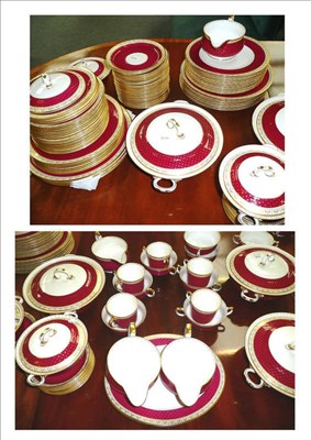 Lot 388 - An extensive Shelley dinner service with gilt and maroon spotted borders