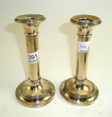 Lot 391 - Pair of silver candlesticks