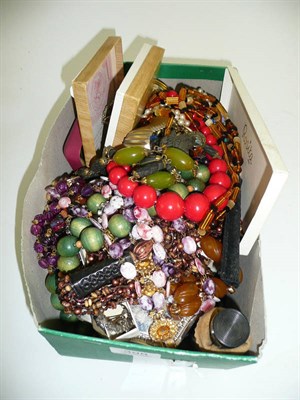 Lot 398 - Assorted costume jewellery including a silver bangle, brooches, beads, a compact etc