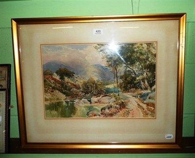 Lot 420 - A watercolour mountainous river landscape, signed J Morris