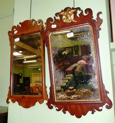 Lot 461 - A walnut fret carved wall mirror and a mahogany fret carved wall mirror (2)