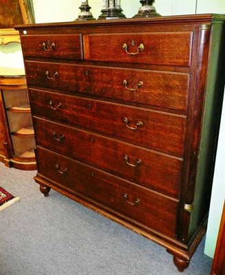 Lot 463 - A Georgian oak five height chest of drawers