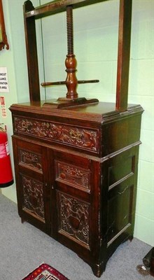 Lot 466 - A 19th century oak linen press with cupboard below