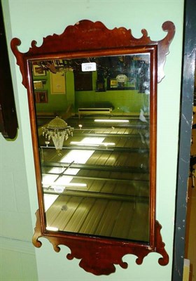 Lot 467 - A Georgian style fret carved mirror