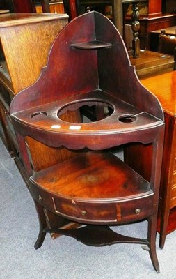 Lot 481 - A mahogany corner washstand