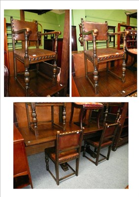 Lot 484 - 1920/1930's oak draw leaf dining table and four oak chairs