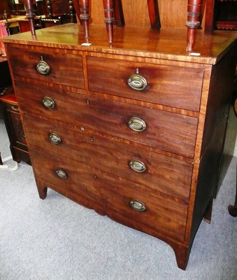 Lot 494 - A 19th century mahogany straight front chest of two short and three long drawers - cut