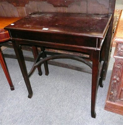 Lot 499 - A mahogany metamorphic desk with hinged and rising top